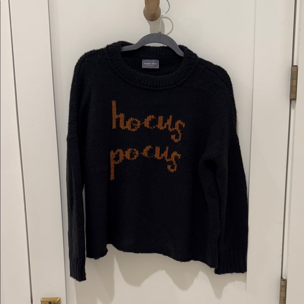 Wooden Ships Black Sweater with Orange Text